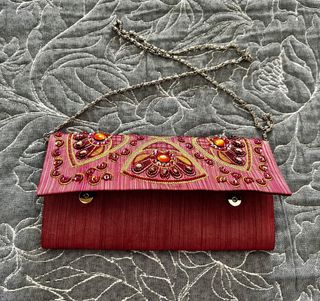 Bolso fiesta pedrería naranja y lentejuelas