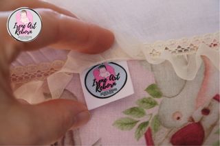 Cojín para reborn casitas de pajaritos rosas T.L