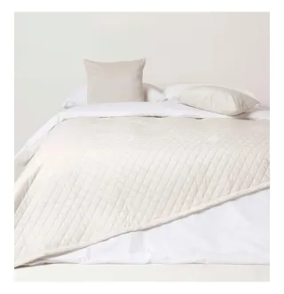 Manta beige/blanca para sofá o cama