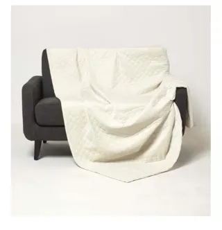 Manta beige/blanca para sofá o cama