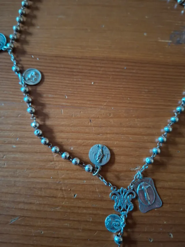 Rosario antiguo con medallas de plata