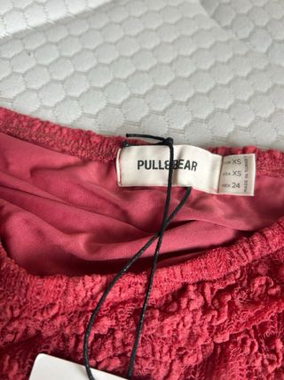Falda de encaje de Pull and Bear XS rosa coral