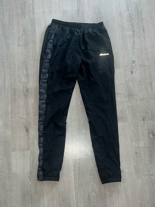 Conjunto deportivo Ellesse negro y gris