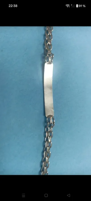 Esclava de plata grabada