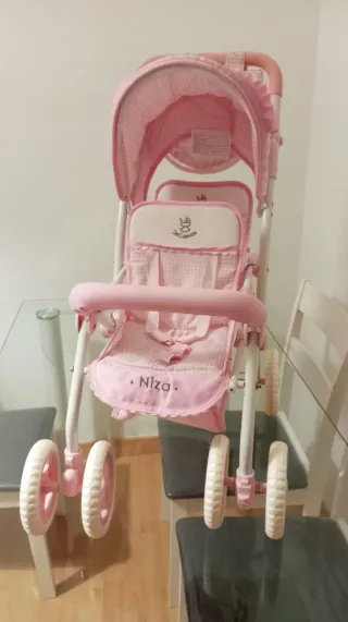 Cochecito gemelar para muñecas rosa