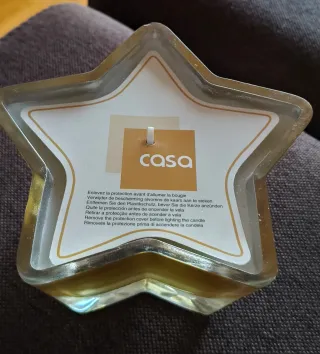 Candela a stella dorata trasparente