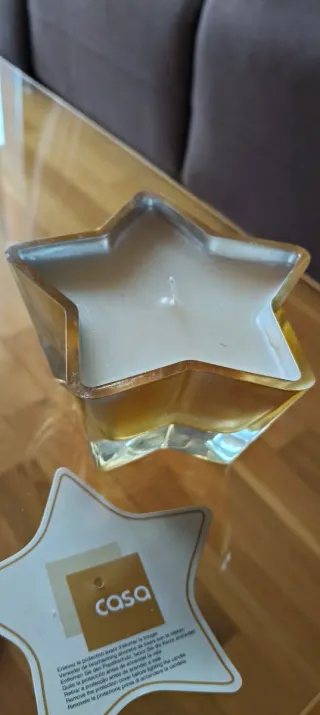 Candela a stella dorata trasparente