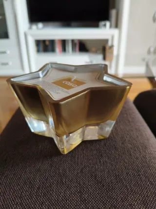 Candela a stella dorata trasparente