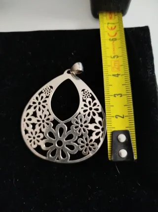 Colgantes plata con flor y cara