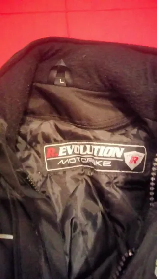 Chaqueta de moto negra y azul