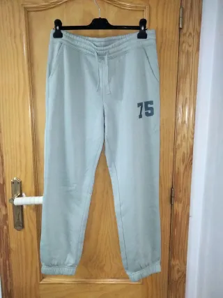 Pantalón chándal mujer verde con número 75