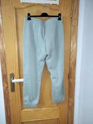 Pantalón chándal mujer verde con número 75