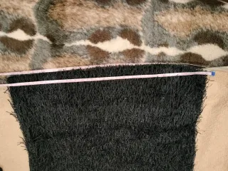 Top negro con flecos y brillos