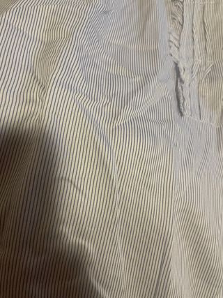 Camisa de rayas con detalle