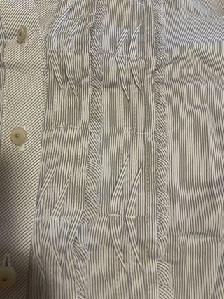 Camisa de rayas con detalle