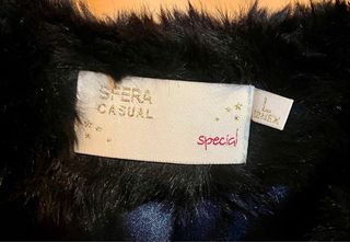 Abrigo de pelo negro