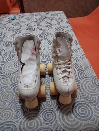 Patines de 4 ruedas blancos de la marca oxelo