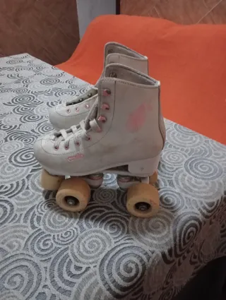 Patines de 4 ruedas blancos de la marca oxelo