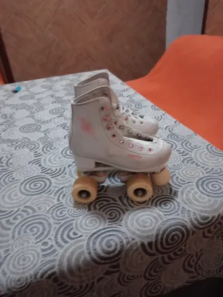 Patines de 4 ruedas blancos de la marca oxelo
