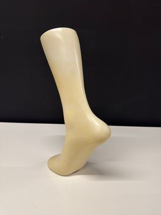 Pie de exposición beige