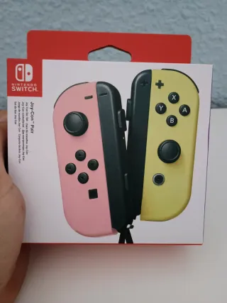 Mandos JoyCon Nintendo Switch Rosa y Amarillo.