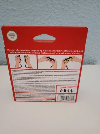 Mandos JoyCon Nintendo Switch Rosa y Amarillo.