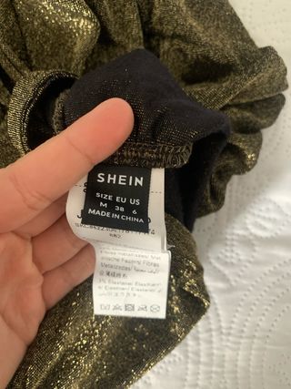 Vestido dorado drapeado