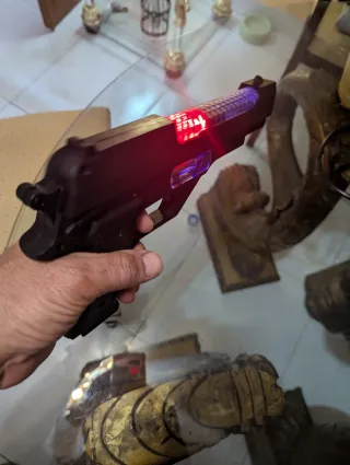 Pistola de juguete con luces