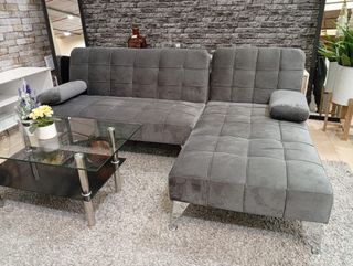 Sofa cama con cojines