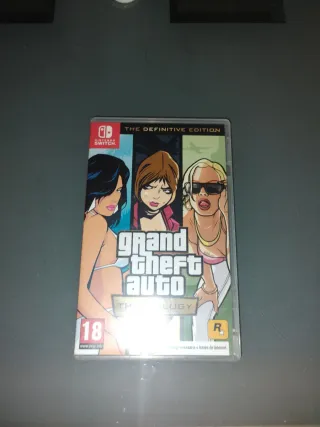 Nintendo Switch con base y mandos, sin cargador