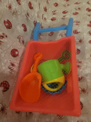 Juegos de playa y carretilla