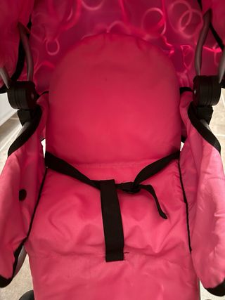 Carro de muñecas rosa y morado