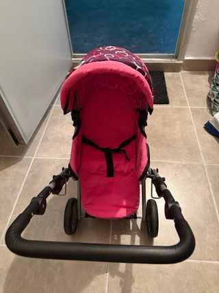 Carro de muñecas rosa y morado