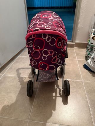 Carro de muñecas rosa y morado