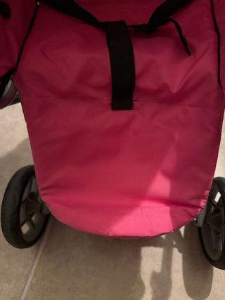 Carro de muñecas rosa y morado