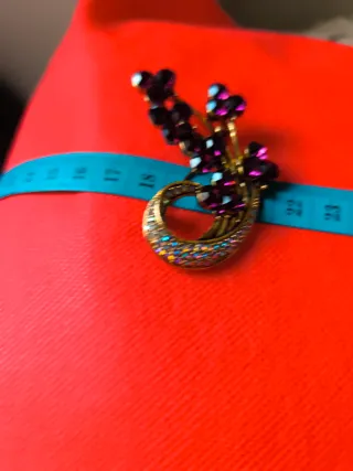 Set de 2 broches de loro y flor.