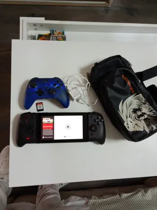 Nintendo Switch + Mando Pro + Bolsaby juego