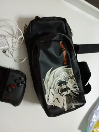 Nintendo Switch + Mando Pro + Bolsaby juego