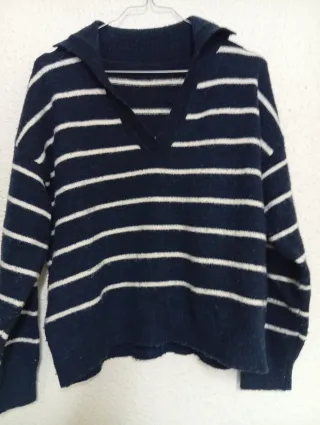 Jersey rayas azul y blanco y otro negro