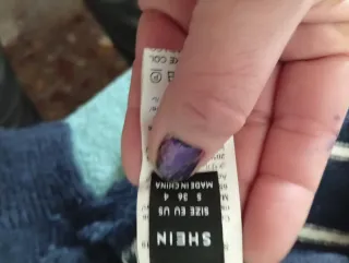 Jersey rayas azul y blanco y otro negro