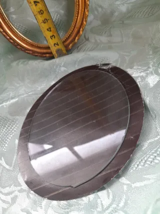 Cornice dorata in resina con vetro