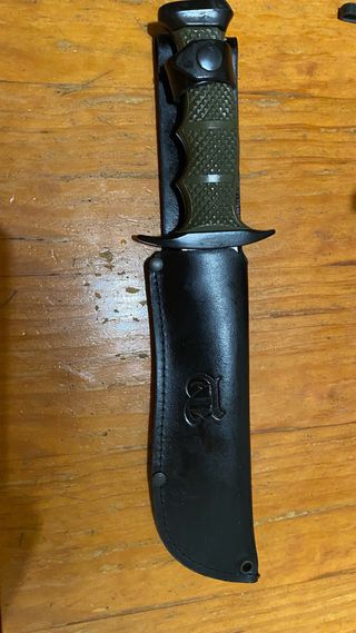 Herramienta ,Andújar con funda de cuero.