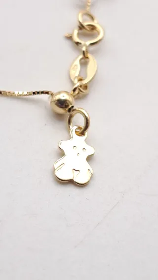 Cadena y Cruz Tous Oro 18k