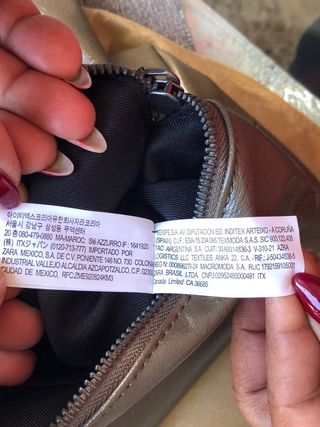 Bolso Zara verde militar con cadena plateada