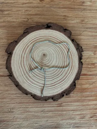 Pulsera acero ajustable.