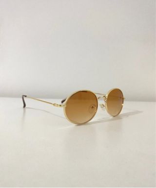 Óculos de Sol Ovais Dourados com Lentes Castanhas
