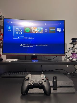 PlayStation 4 en perfecto estado + mando + cables