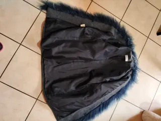 Giacca elegante donna con piume blu