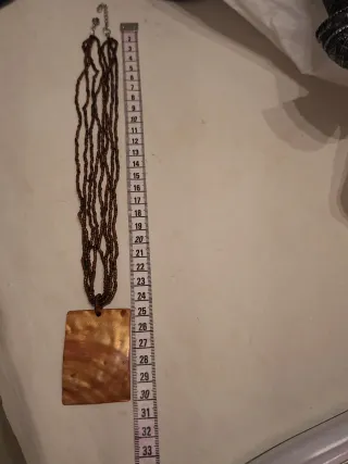 Conjunto collar, pendientes y pulsera de nacar