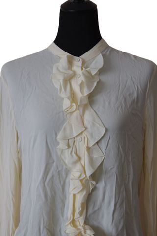 Camisa / blusa de manga larga con detalle de volan